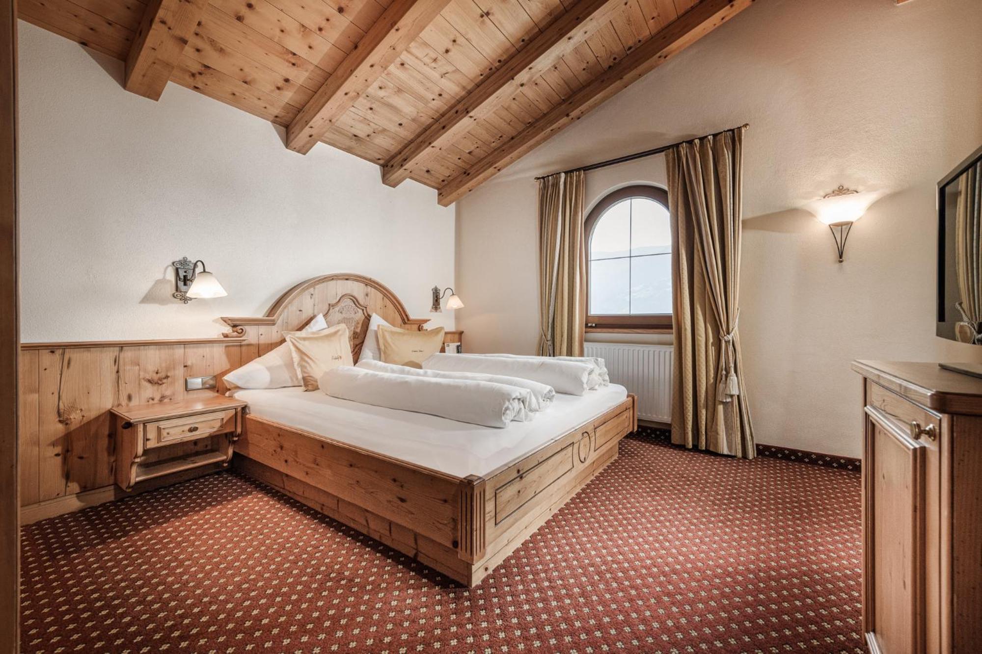 Aster Boutique Hotel & Chalets Fuegenberg Habitación foto